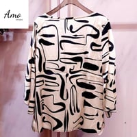 بلوزة واسعة خامة ناعمة مشجرة بياقة دائرية الأكمام...