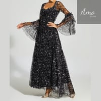 فستان ماكسي لون أسود مشجر تصميم كلاسيك يظهر جمالك...