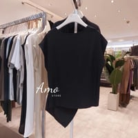 بلوزة لون أبيض صيفي ب درابي من الوسط نهاية لف MABL...