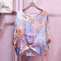 بلوزة واسعة خامة ناعمة مشجرة بياقة دائرية مخصرة نه...