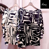 بلوزة واسعة خامة ناعمة مشجرة بياقة دائرية الأكمام...