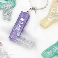 ميداليه حرف بداخله اسم