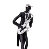 مجسم موسيقي الساكسفون باللون الاسود