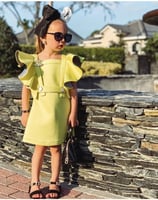 فستان اخضر بكرانيش كبيره بتصميم عصري