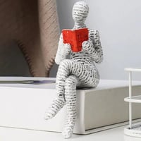 مجسم شخص يقرأ ديكور