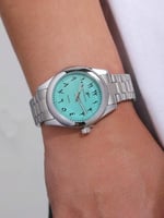 ساعة بخط عربي بكوالتي أنيق