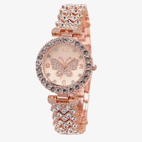 ساعة دائرية منقوش بها فراشة مرصعة بالكرستال