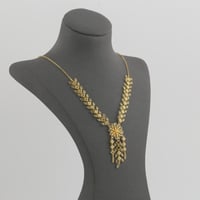 طقم ذهب ورق الزيتون منقوش - عيار 21