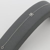 اسوارة ذهب زهرة بيضاء عيار 18