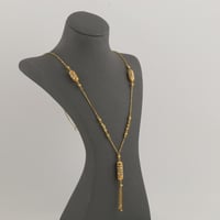 سبحة ذهب مبروم بتصميم اسطواني مزخرف ملون - عيار 21