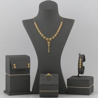 طقم ذهب بتصميم ورود ملفتة مع دلايات - عيار 21