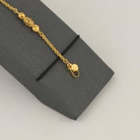 اسوارة ذهب مبروم كرات الليزر و تصميم بيضاوي مزخرف...