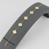 اسوارة ذهب خمس ازهار عيار 18