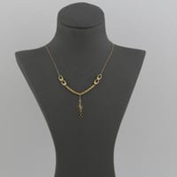 عقد ذهب حلقات مبروم مع تعليقات وردة - عيار 21