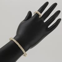 اسوارة و خاتم ذهب بتصميم كريستال ملفت - عيار 18