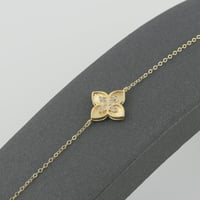 اسوارة ذهب زهرة متوسط عيار 18