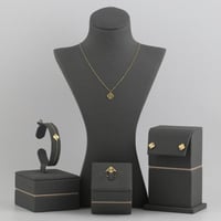 طقم ذهب بتصميم نبتة رباعية ناعم - عيار21