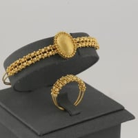 اسوارة و خاتم ذهب كرات الليزر بيضاوي بصمة - عيار 2...