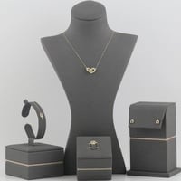 طقم ذهب بتصميم جريء لماع - عيار 18