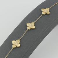 اسوارة ذهب ثلاث ازهار عيار 18