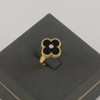 خاتم ذهب بتصميم نبتة رباعية سوداء - عيار 18