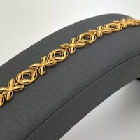 اسوارة ذهب قص ازهار و اوراق الزهور عيار 21