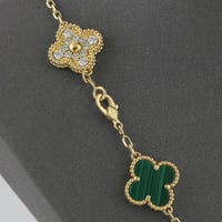 عقد ذهب ورود خضراء و لماعة - عيار 18