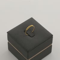 طقم ذهب كرات الليزر مع فصوص ببضاء - عيار21