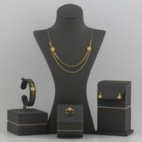 طقم ذهب دورين مبروم و بتصميم هندسي معين - عيار21