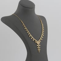 طقم ذهب دوائر و دمعة و وردة - عيار21