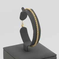 سوارة وخاتم ذهب دوريكا عيار 18