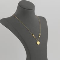 عقد ذهب حلقات منقوشة مع نبتة رباعية - عيار 21