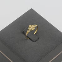 خاتم ذهب بتصميم نبتة رباعية - عيار 21