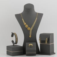 طقم ذهب الزهرة منقوش - عيار 21