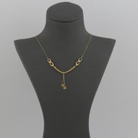 عقد ذهب حلقات مبروم مع تعليقات وردة - عيار 21