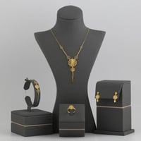 طقم ذهب بأجزاء مبرومة مع وردة ملفتة - عيار21