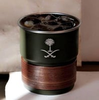 كوب سيفين ونخلة أخضر