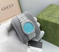 ساعة قوتشي بكرستال فضي