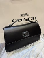 شنطه كوتش اسود