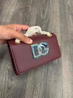 شنطه ودولتشي قابانا عنابي ماستر