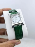 ساعه هرمز جلد اخضر