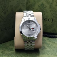 ساعه قوتشي فضي رجالي مع الملحقات الماركه