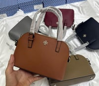 شنط توري بورش لوقو فضي جلد مطفي