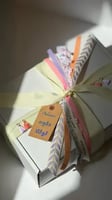 تغليف مع تاق مخصص بالاسم + ٥ ريال