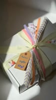 تغليف مع تاق مخصص بالاسم + ٥ ريال