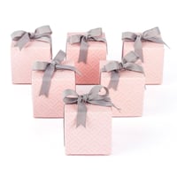 توزيعات بوكسات مقلمة وردي