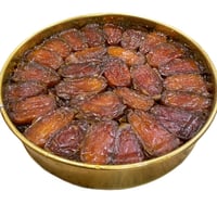 تنكة دائرية 2 كيلو تمر صفري بيشة صافي حبة وسط