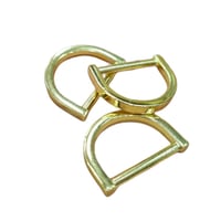 حلقات معدنيه حرف D للشنط ذهبي وفضي الدرزن 12 حبه