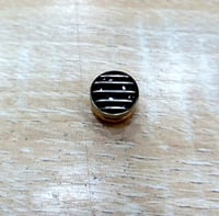 أزارير ثياب رجاليه طقطق