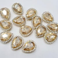 فصوص كريستال بقاعده شكل دمعه مقاس 18×15 ملم